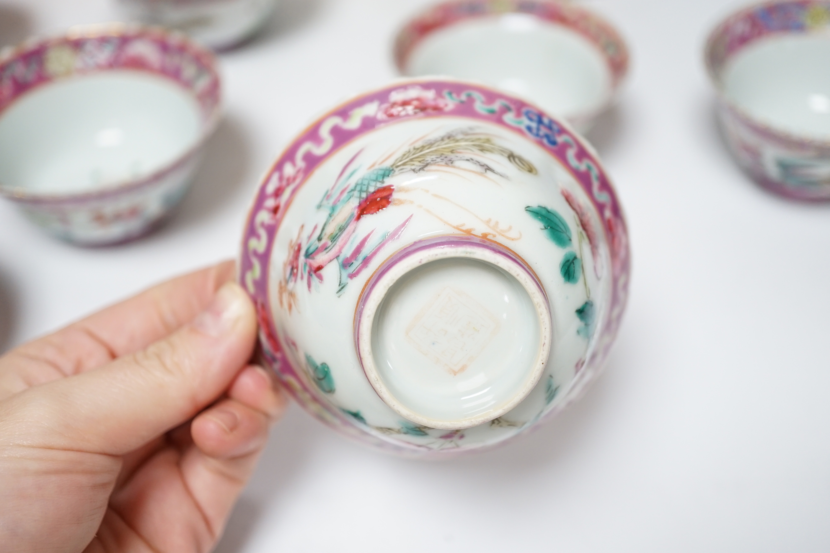 A Chinese Straits enamelled porcelain teapot and cover and seven similar tea bowls, Guangxu period and a pillow, teapot 18cm high including cover